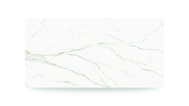 The image shows a white surface with thin, delicate gray and beige veining in an irregular pattern, resembling a polished marble or quartz countertop.