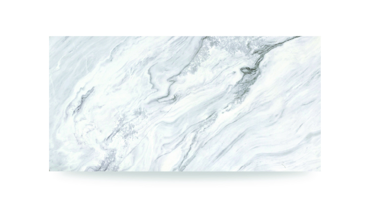 The image shows a white surface with soft, flowing gray veining in a wavy pattern, resembling a marble or quartz countertop with a polished finish.