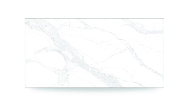 The image shows a white surface with soft, gray veining in a flowing, irregular pattern, resembling a marble or quartz countertop with a polished finish.