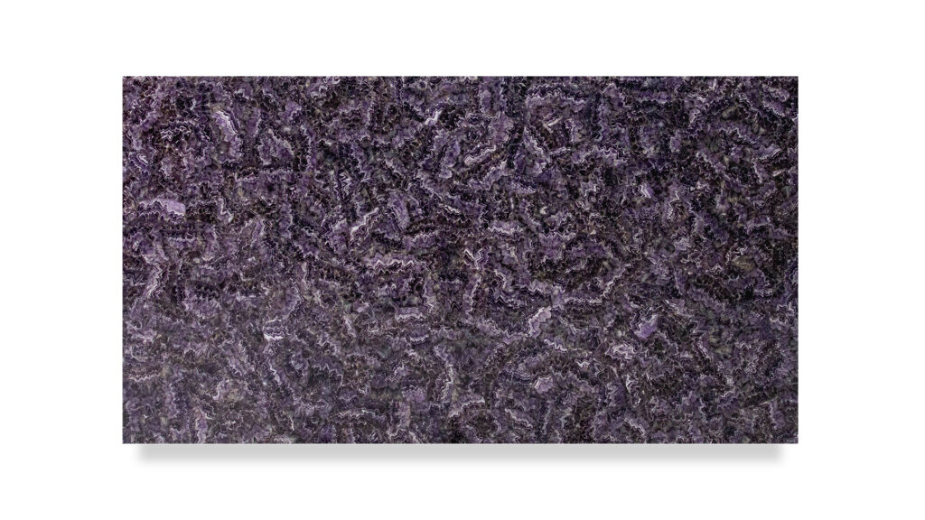 A semi-precious Amethyst Dark slab, featuring a complex pattern of deep purple and black crystalline formations, creating a rich, textured appearance.