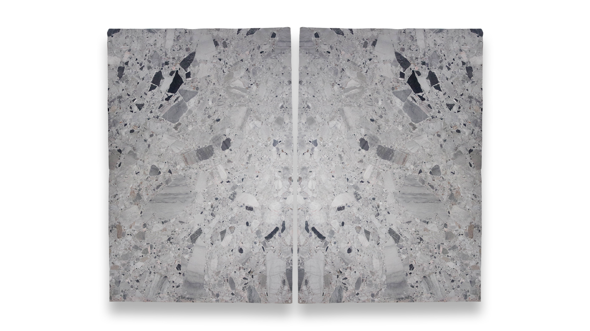 A duo-panel artwork of Appia Grey Leathered Marble, featuring a symmetrical pattern with a blend of gray, white, and black tones, and scattered fragments.