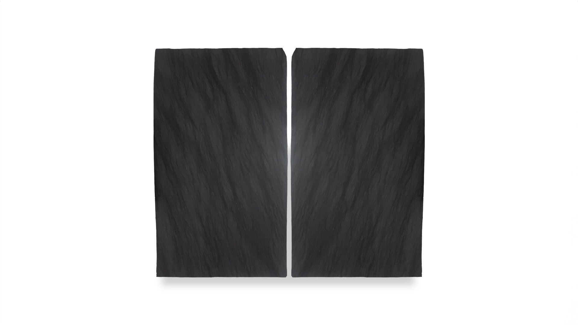 A duo arrangement of Black Vermont Brushed slabs, featuring a sleek, matte black surface with subtle natural texture and linear grain patterns.