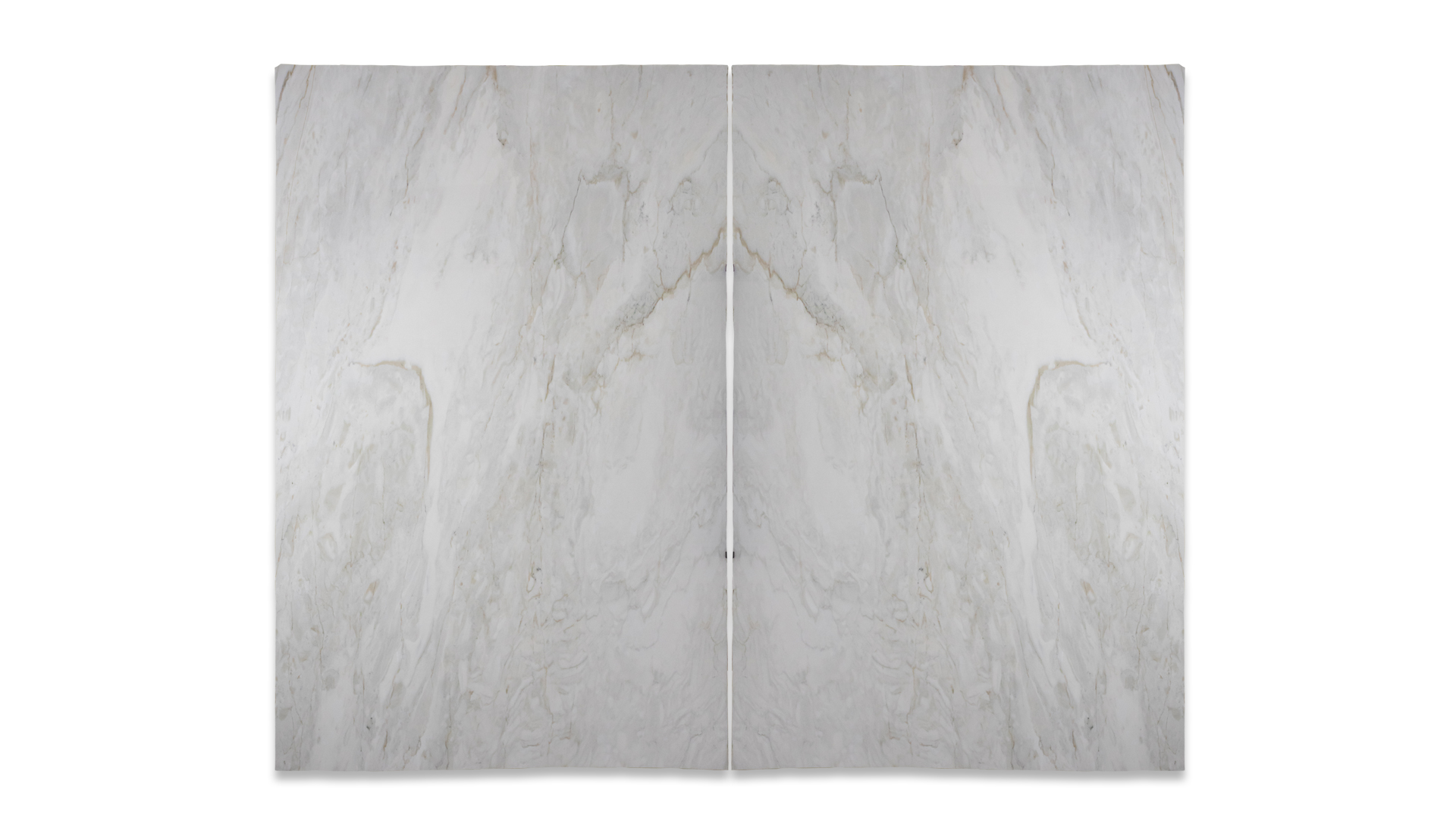 A pair of Calacatta Cremo polished marble slabs arranged in a bookmatch pattern, displaying a white background with subtle gray and beige veining.