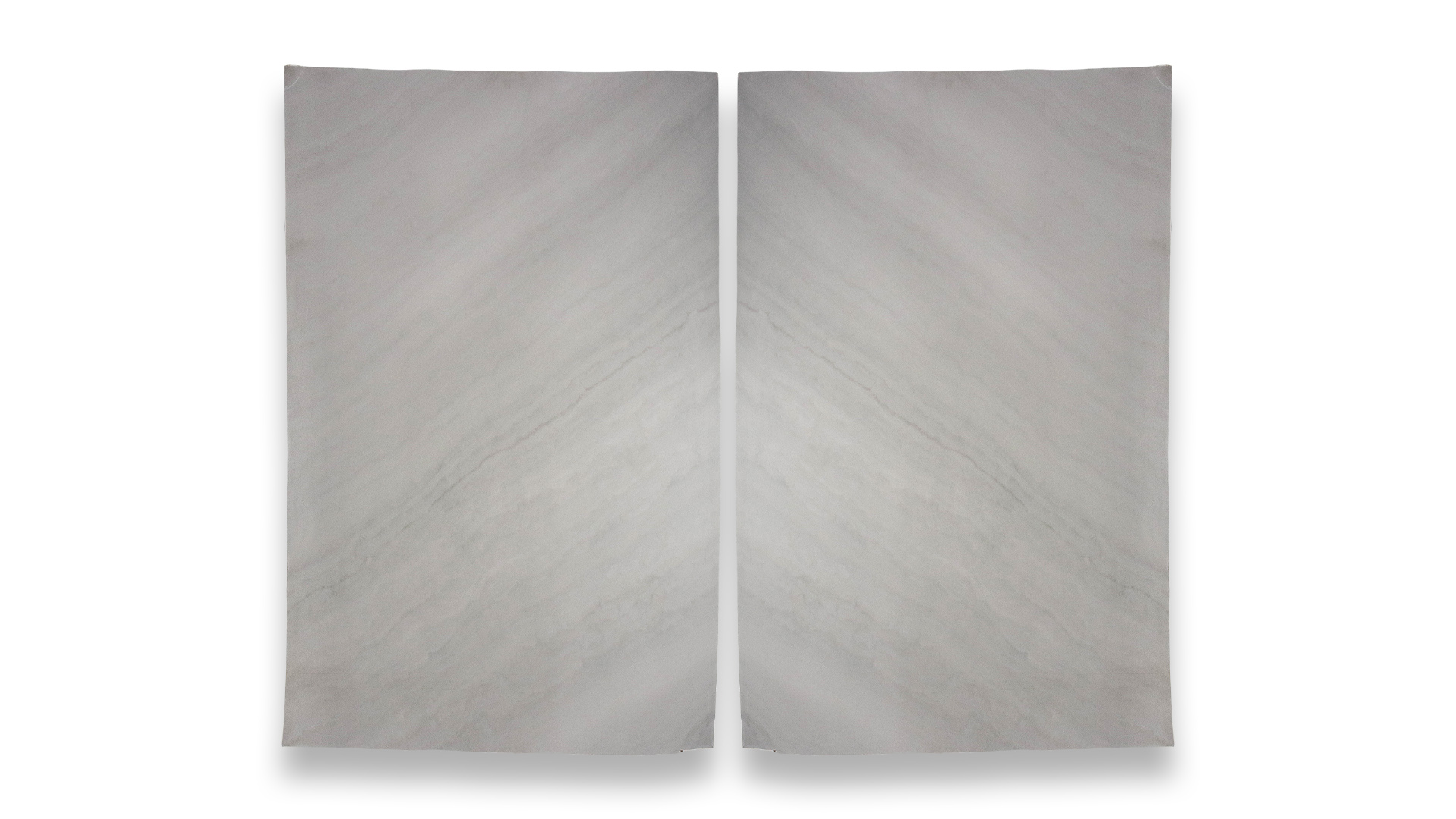 This image shows two Grey Colossus Honed quartzite slabs in a duo layout, featuring a smooth, light gray surface with subtle diagonal striations.