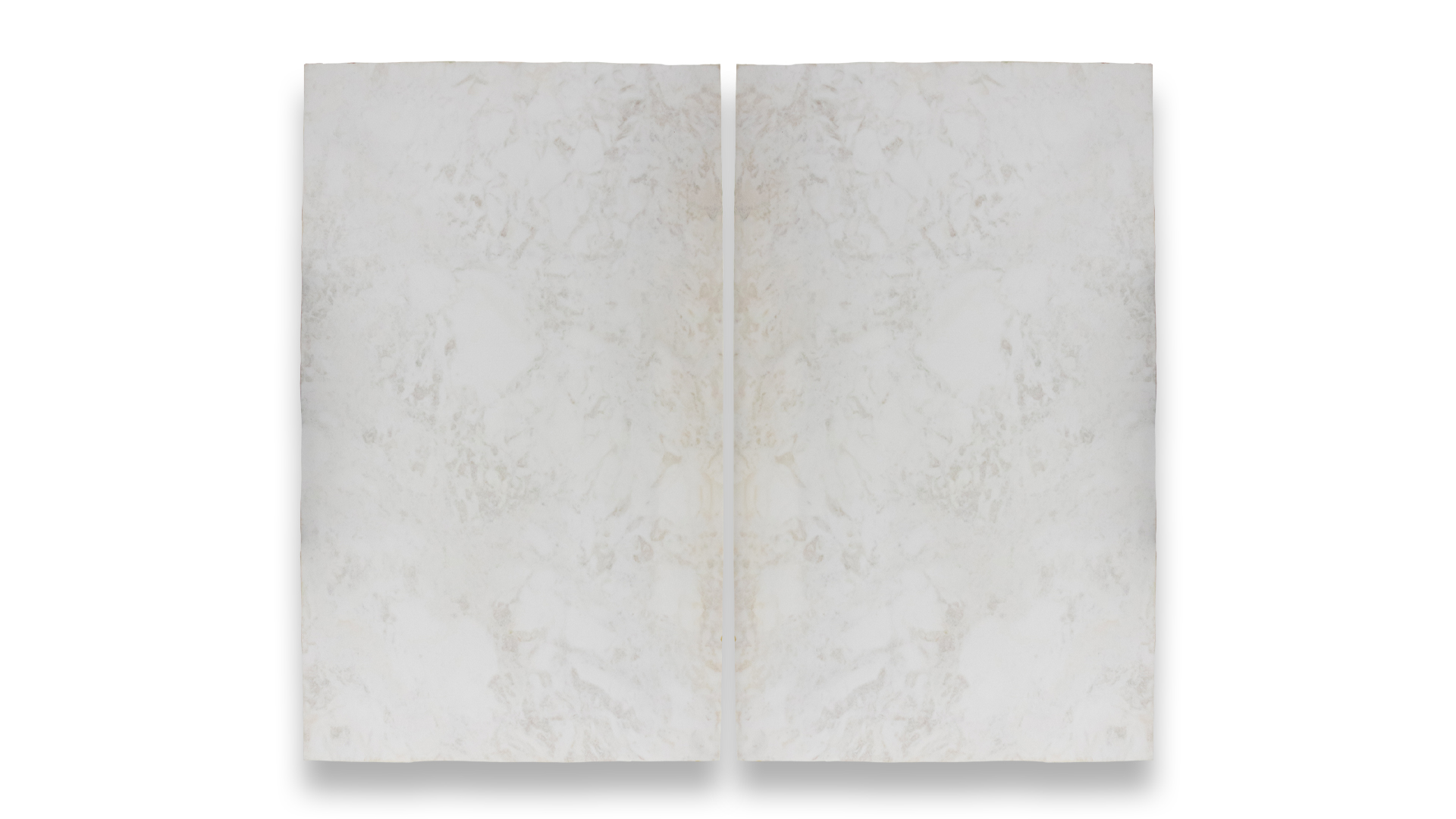 Two slabs of White Rhino Leathered Marble arranged side by side, showcasing a smooth, white surface with subtle beige and grey veining.