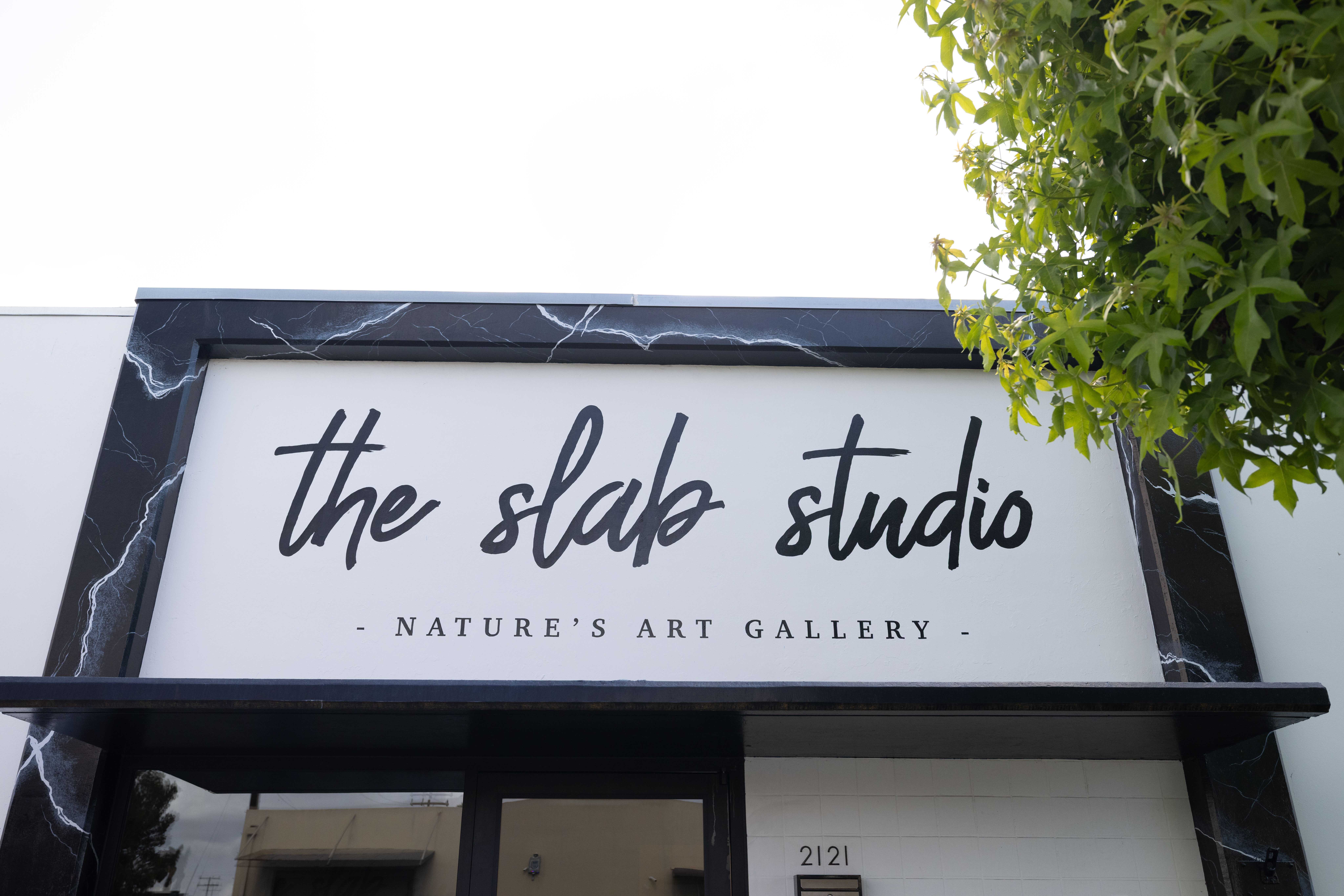 Exterior entrance of The Slab Studio natural stone showroom in Santa Ana California