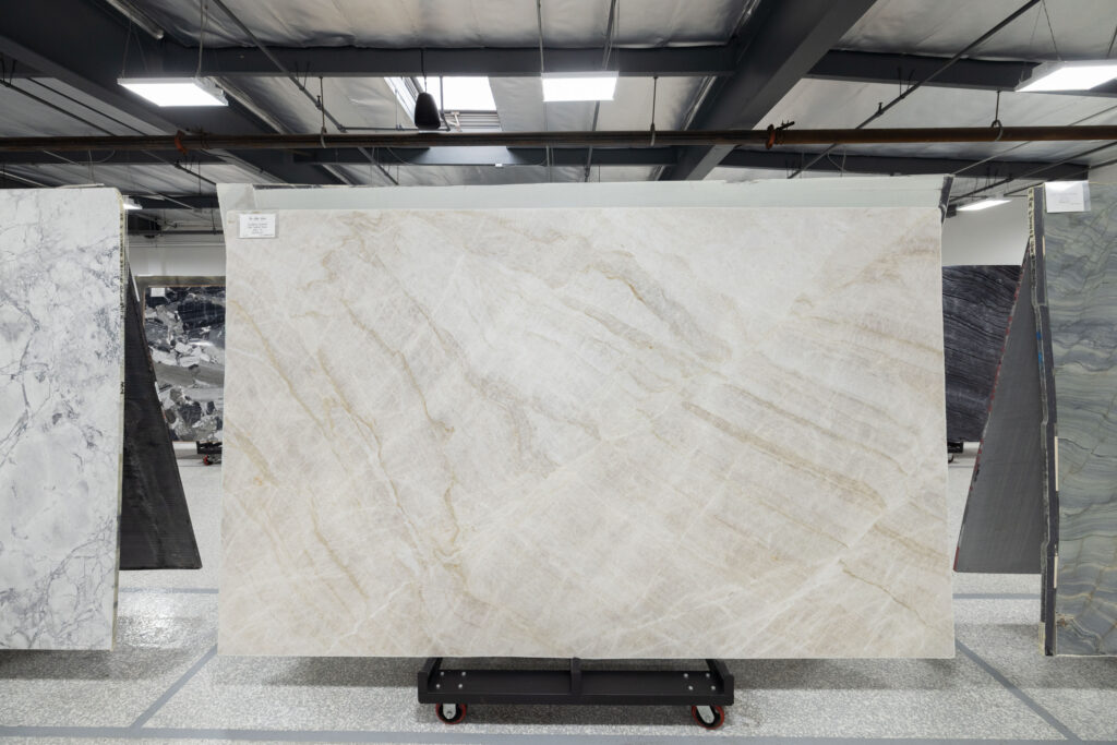 Warm-toned quartzite slab on display at The Slab Studio in Santa Ana