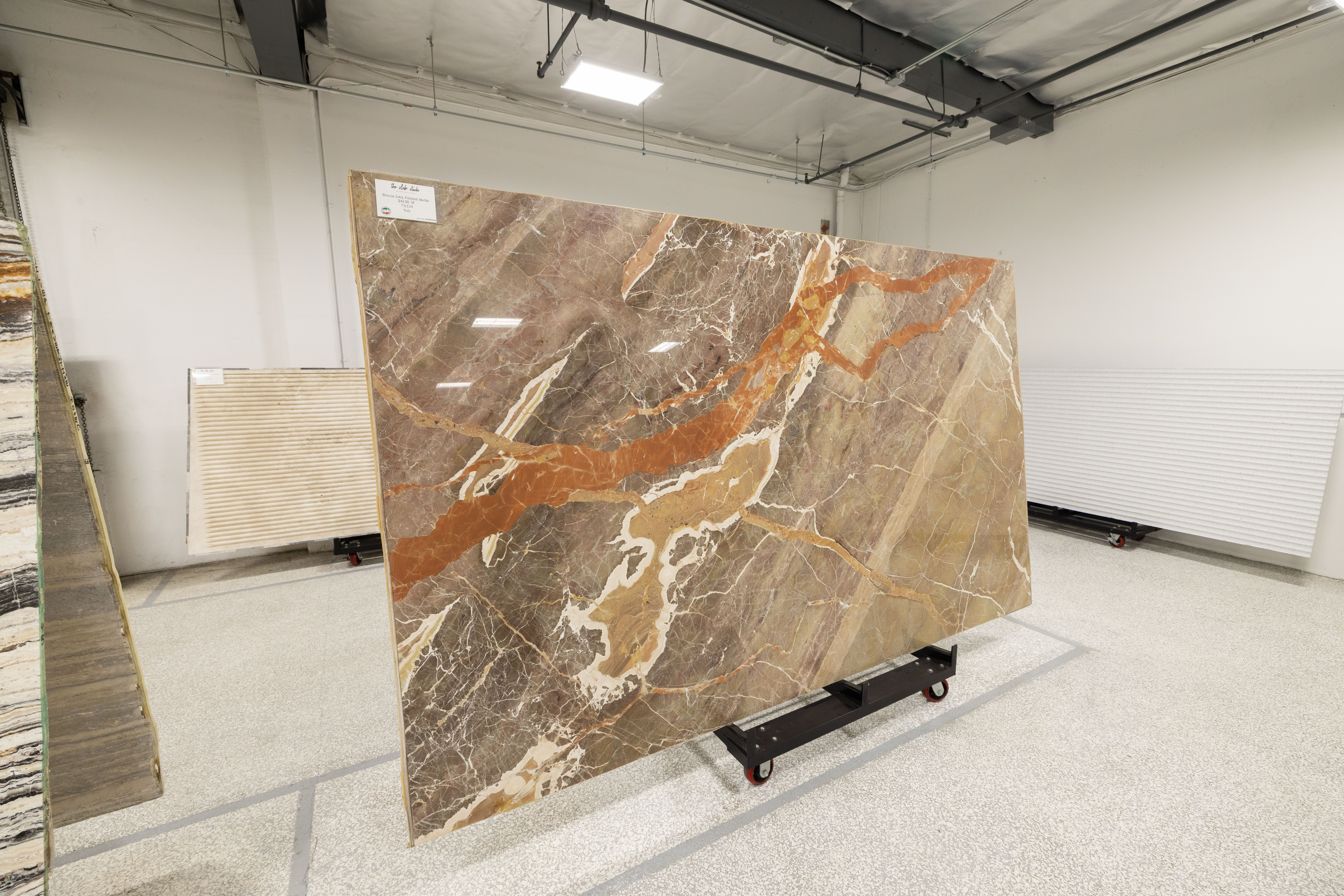 Warm-toned natural stone slab for fall interior fabrication projects