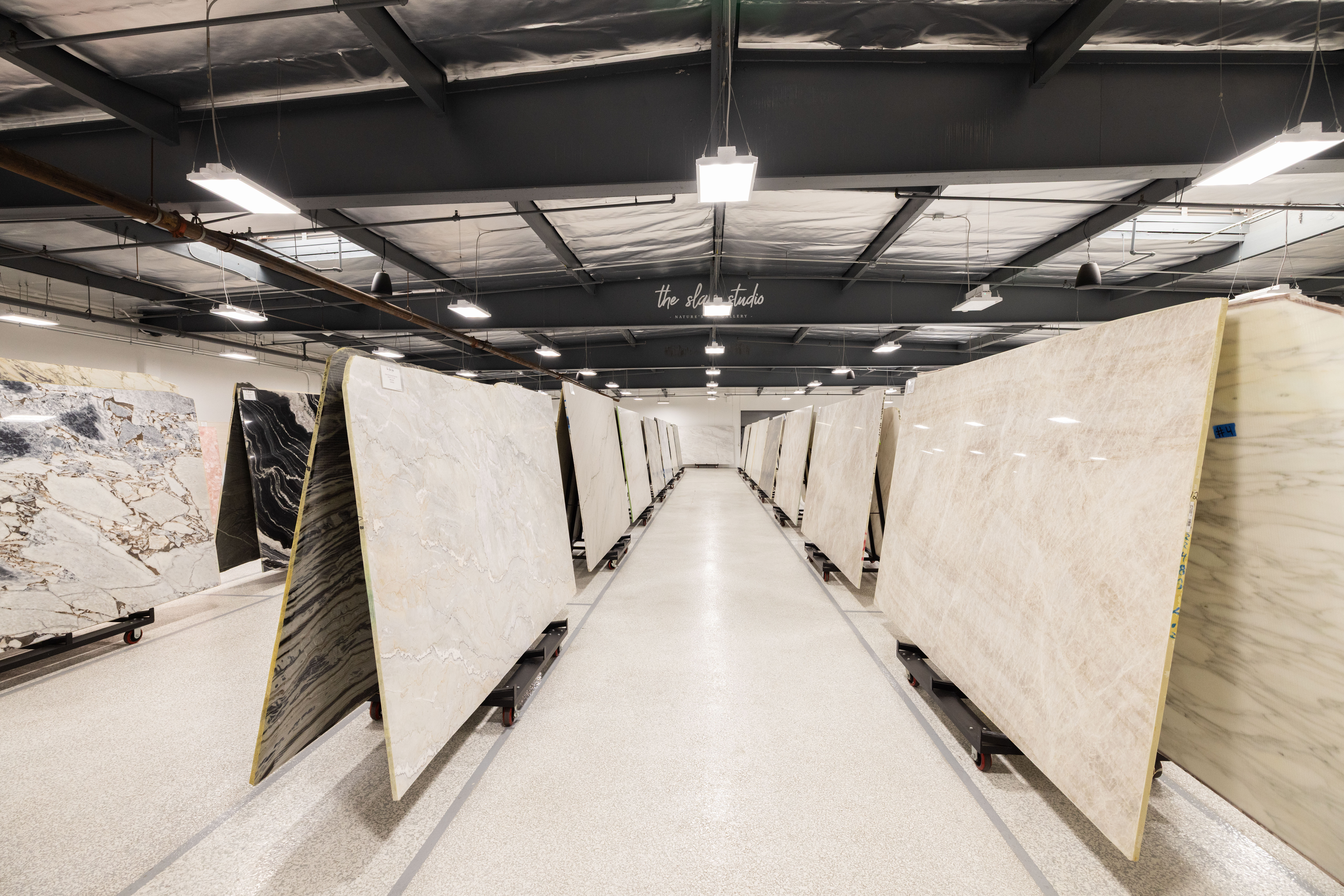 Natural stone slab inventory at The Slab Studio in Santa Ana